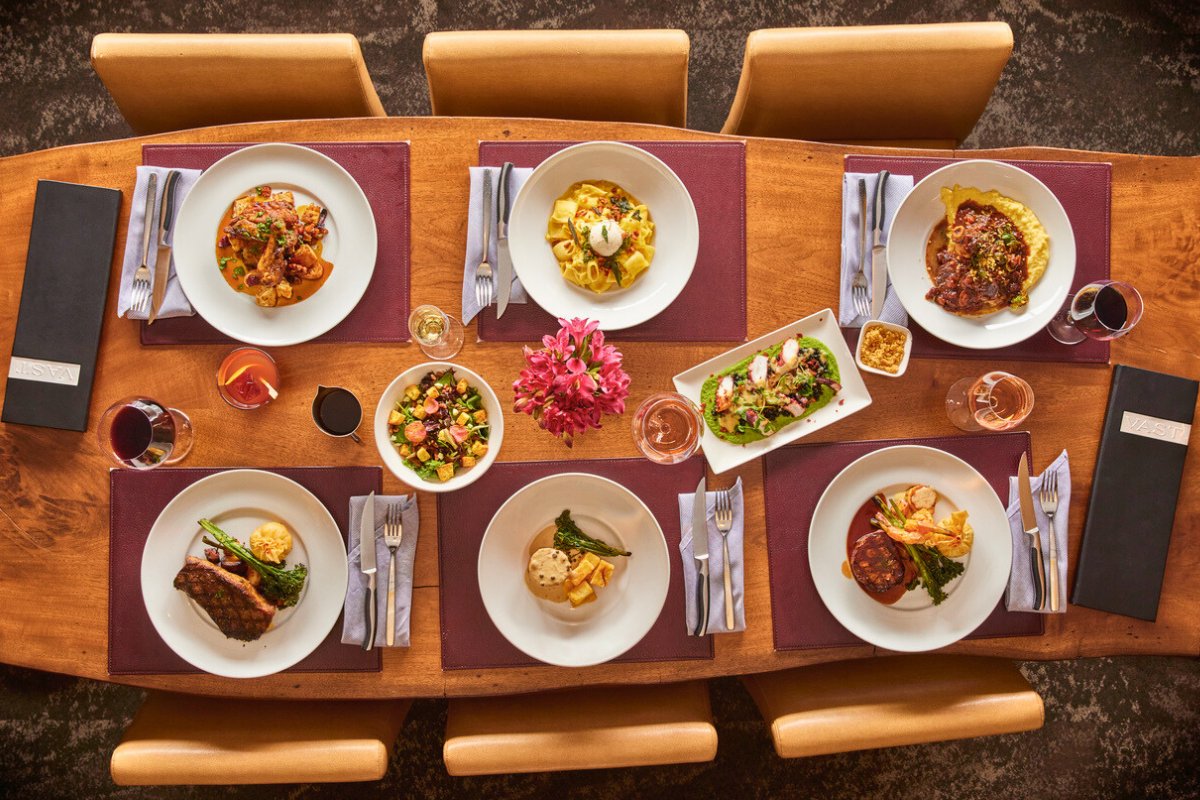 Six Dinner Menu Items on a table at Vast Restaurant in Downtown OKC